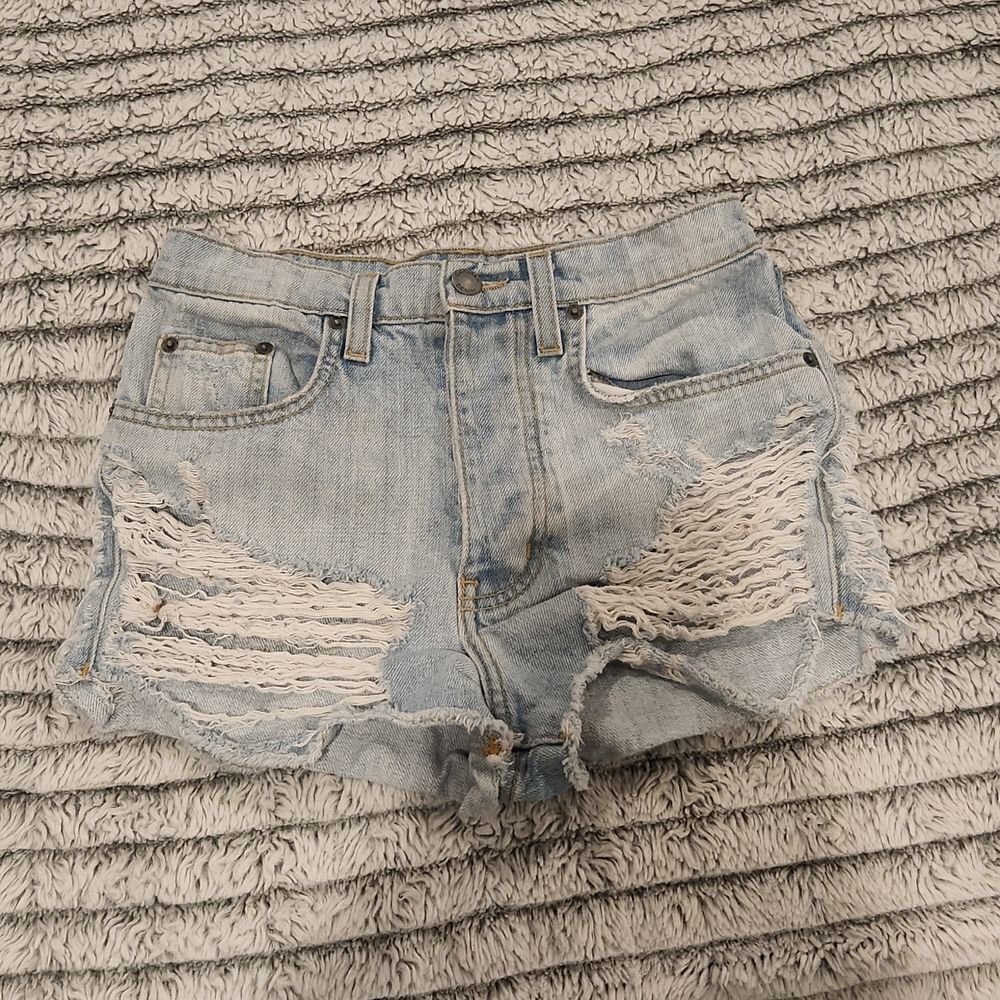 Light wash majorly distressed Carmar hight waist button down shorts size 24